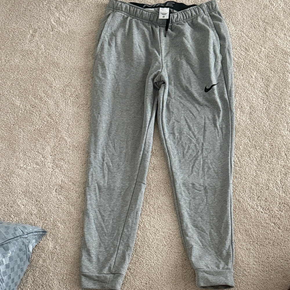 Nike men’s Light Gray Joggers